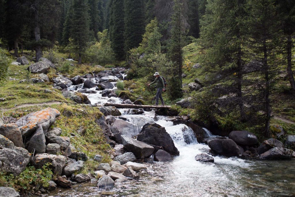 Crossing a bridge in Karakol Valley on the Ak Suu Transverse Trail