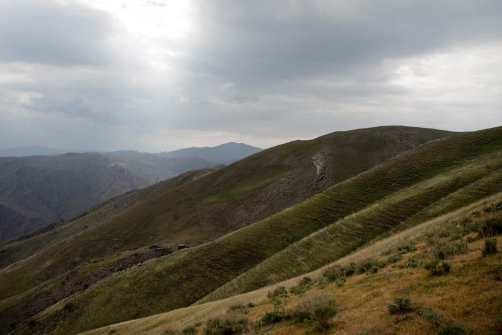 Climbing towards Fazilman Lake in Uzbekistan's Nuratau Mountains