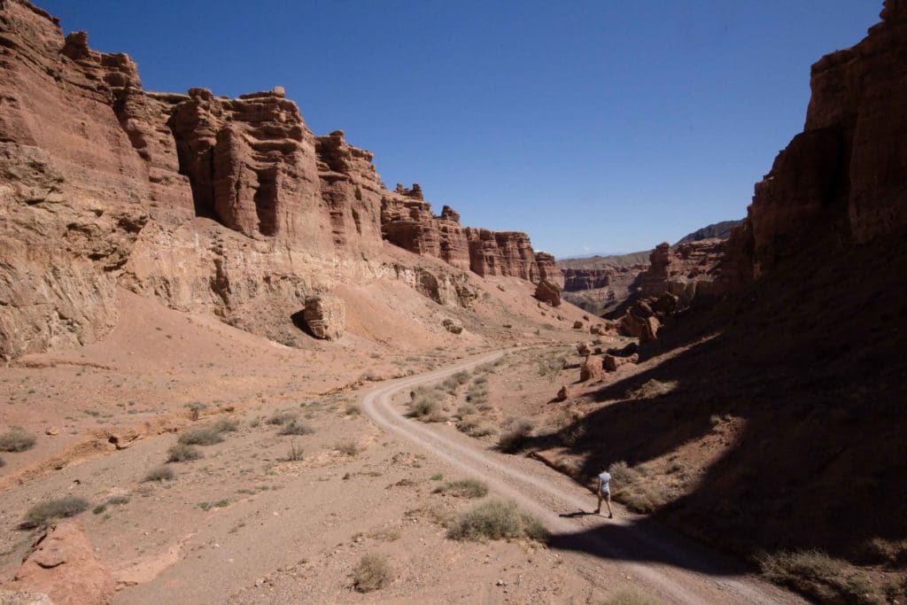 Tourist walking in Charyn Canyon